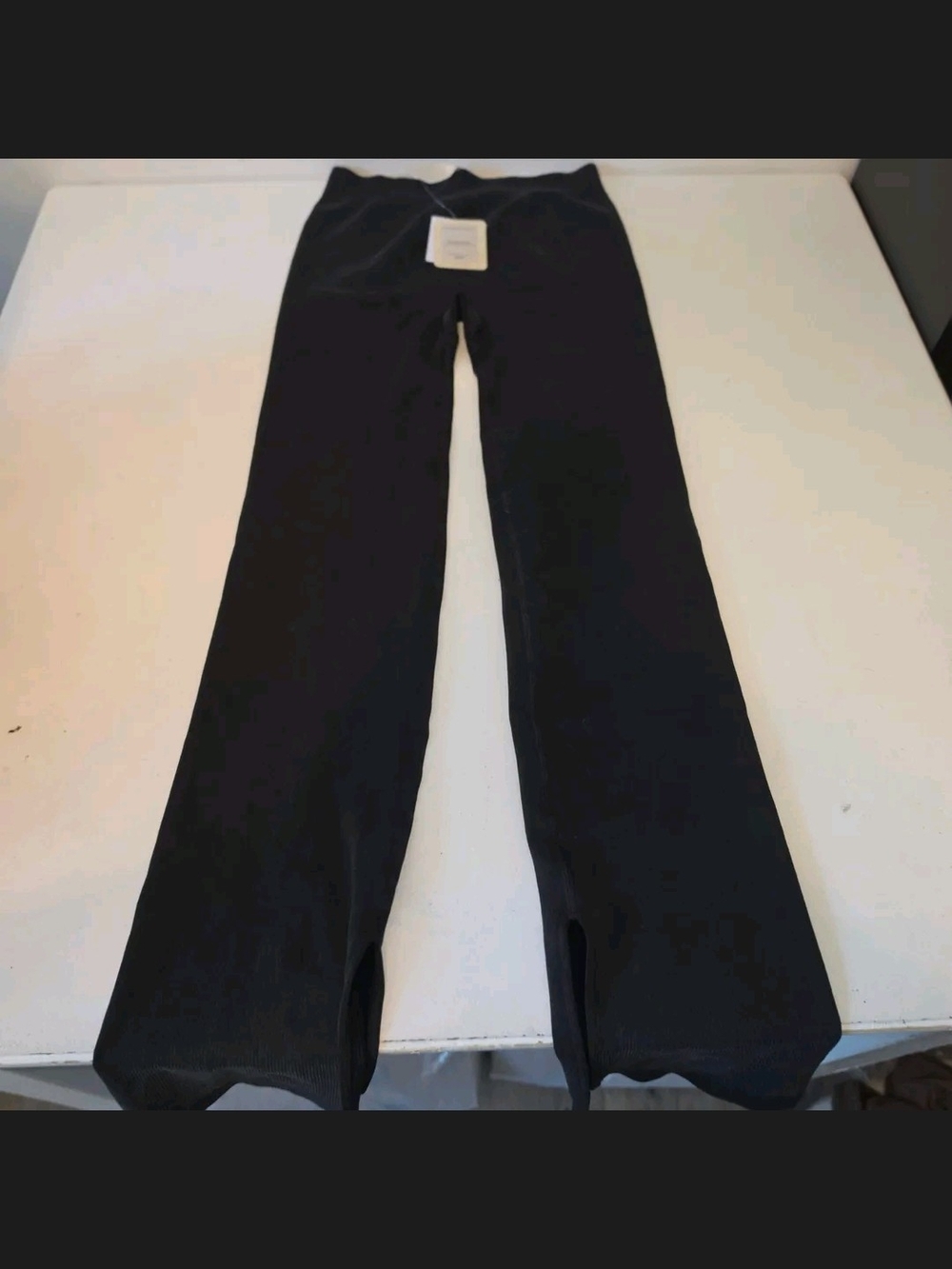 Black ribbed knit flare pants with side slits #flare #ribbed